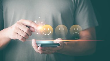 Male consumers rate their satisfaction and rate and review them online. Customer Experience Survey Concepts for Services and Products and Customer Engagement