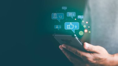 Young businessman using social networks to communicate around the world via smartphone, network connection concept, social marketing, social media, commenting and sharing ideas in the internet.