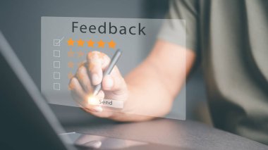 Customer Service and Satisfaction Concept businessman using a virtual touch screen pen to provide satisfaction in service Very impressive rating,positive feedback concept,evaluating the use services