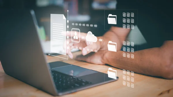 Businesspeople manage corporate document databases through the cloud, cyberspace technology concepts and large, paperless archives of important and large documents, file management and online storage