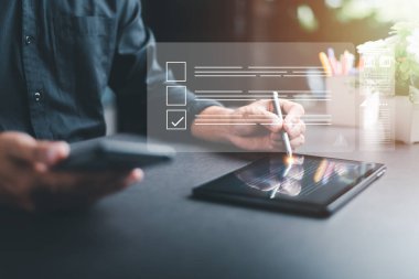 concept of rules of conduct, rules and policies,company articles of association,Terms and Conditions,Businessman checking documents online with tablet,commenting, putting checkmark on a business test