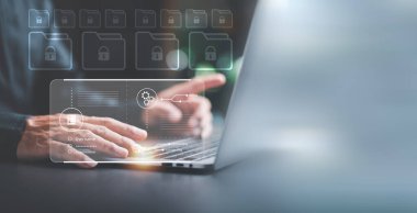 Businessman showing login icon to manage files,documents,online documentation database and process automation to efficiently manage files,cybersecurity concept on internet,authorizing secure logins