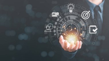Businessman showing virtual icon in hand, time management concept,effective business planning,time management in the organization,Agreement and solution,