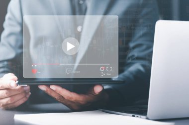 businessperson using laptop to watch video,Training, learning, teaching, virtual reality used in online video conferencing,Online streaming Watch videos on the Internet