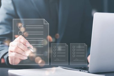 a man reviewing and managing business documents and agreements online,signing a business contract approval of contract documents confirmation or warranty certificate,employment idea, project review