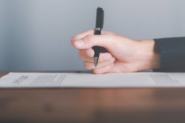 business accounting documents,auditor,management and auditing of office documents,Reports for Tax Time Analysis,office worker working with documents at home office desk,work at home