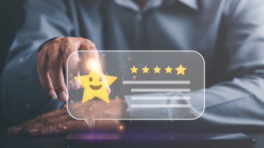 customer service and satisfaction concept,service satisfaction,very impressive rating,Evaluation and Audit,Businessman showing 5 stars icon representing the highest quality in goods and services.