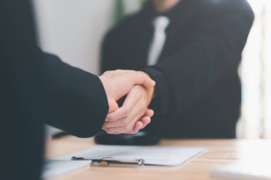 Businessmen shaking hands to indicate a business deal,successful contract management of the company,signing an agreement,business partner,New opportunities for the future of the industry,joint venture