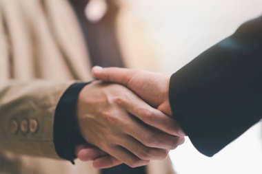 Businessmen shaking hands to indicate a business deal,successful contract management of the company,signing an agreement,business partner,New opportunities for the future of the industry,joint venture