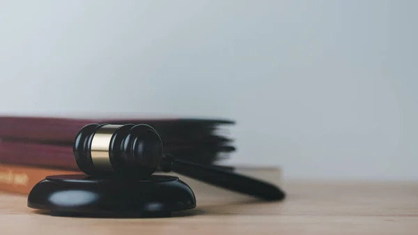 Wooden judge gavel and legal book,law legal services advice and inspection,legal and justice concepts,Judgment and consideration symbol civil and criminal cases