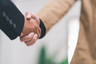 businessman shaking hands indicating agreement business, concept progress in development, financial efficiency and investment with business strategy for goals and opportunities in industry future
