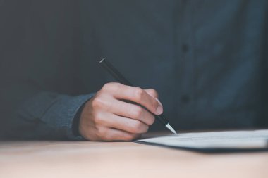 businessman signing document ,Signing a form ,validates and manages business documents and agreements ,signing a business contract approval ,contract documents confirmation or warranty certificate