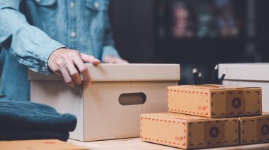 Startups or Small Business Entrepreneurs, Pack products for delivery, manage orders in online stores, shop online, sell online on the internet, SME, e-commerce,dropshipping delivery service concept