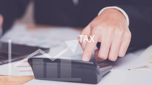 Business people planning annual tax deduction, tax rate calculation, business financial budget, Calculate business balance to reduce taxes ,Individual income tax ,Property and land tax management
