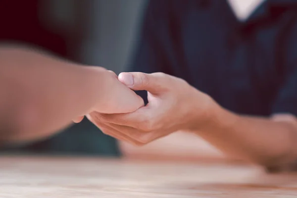 stock image Husband and wife join hands to cheer ,Relationship care concept ,comforting family members ,mutual encouragement ,tenderness ,comfort and sympathy ,helping ,giving hope and believing