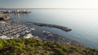 Slow 4K drone fly-by aerial video of Oropesa del Mar sport port in the Mediterranean Sea in Spain. High-quality 4k footage