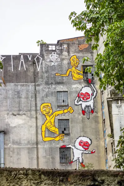 Vertical image of colorful street art graffiti in Sao Paulo buildings in Brazil. High-quality photo