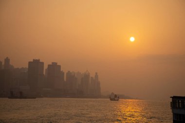 Hong Kong neon sunset iconic harbour skyscrapers illuminated panorama China - stock photo. High-quality photo