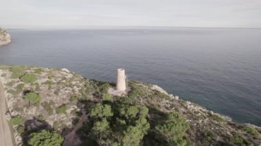 Aerial 4k footage of medieval coastal defensive tower of La Corda in Oropesa, Spain. High-quality 4k footage