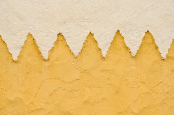 Colorful detail of an old window on an orange-painted wall. High-quality photo