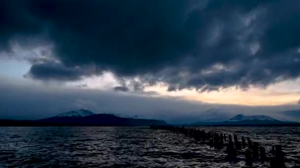 Time Lapse Moving Dark Clouds Old Wooden Pier Snowy Mountains — Vídeo de stock