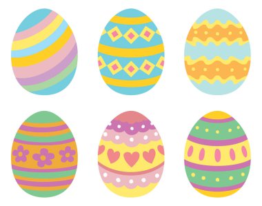 Beyaz arka planda farklı şekillerde Paskalya yumurtaları..