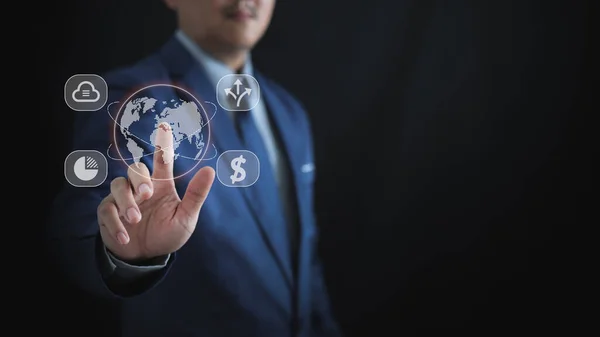 Businessman pointing at a virtual globe, concept by online technology, business leadership concept