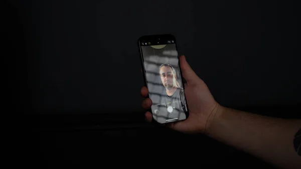 Hand Holding Smartphone Black Background — Stockfoto