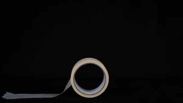 Paper tape. black color Paper tape affixed on the table. paper tape roll