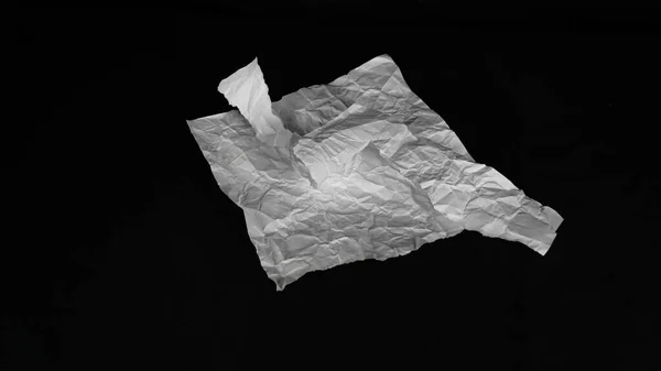 紙をめくれ 白と黒の背景に白のA4紙を引き裂いた — ストック写真
