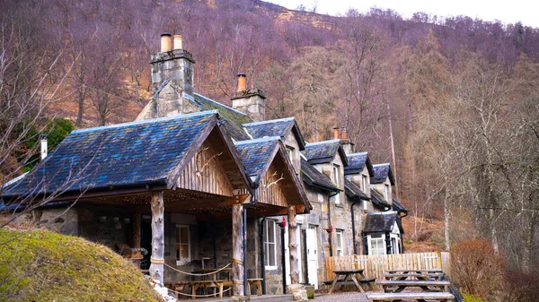old historical houses and cafe in the forest. houses in mountain landscape