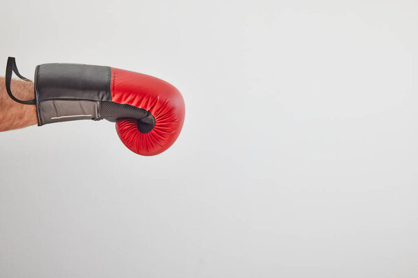 Hand with red boxing and punching glove
