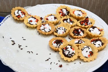 mini fruit pie cake at a formal event.