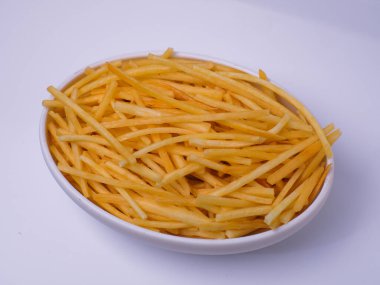 Keripik singkong, cassava chips in a white bowl isolated on white background