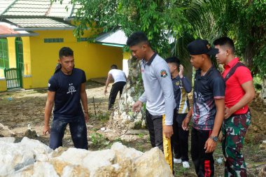 Padang Jaya Village residents are working together to build a retaining wall