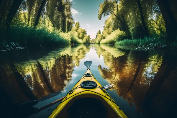 Kayaking on river in wildlife in summer