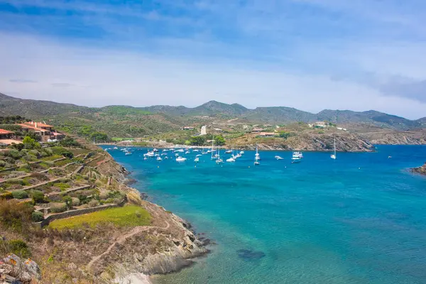 stock image Colorful landscape of a bay with blue and turquoise water in Gerona, Catalonia, Spain on a sunny day with blue sky