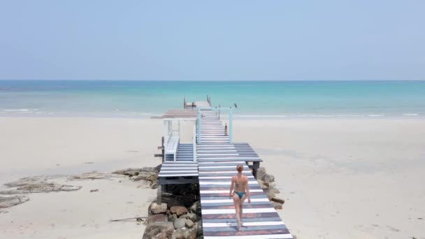 Graceful Stroll Beautiful Young Woman Deserted Island Pier Surrounded White — Stock Video