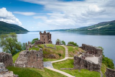 Ruins of Urquhart Castle on  Lake Loch Ness, Scotland clipart
