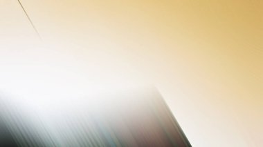 abstract pastel soft colorful smooth blurred textured background off focus toned in gold color