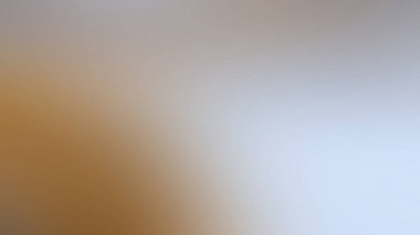 abstract pastel soft colorful smooth blurred textured background off focus toned in gold color