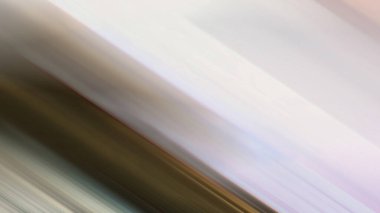 abstract pastel soft colorful smooth blurred textured background off focus toned in gold color