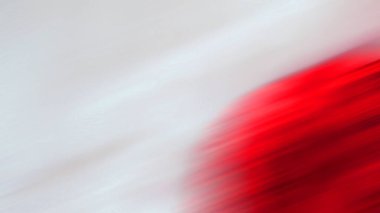 Kırmızı ve beyaz çizgilerin bulanık arkaplanı