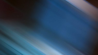 Mavi ve beyaz bir duvarın bulanık fotoğrafı.