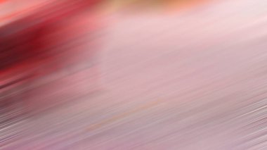 Kırmızı bir araba ve kırmızı bir kamyonun bulanık bir resmi.