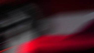 Kırmızı bir arabanın bulanık fotoğrafı.