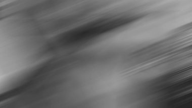 Kaykay tutan birinin bulanık görüntüsü.