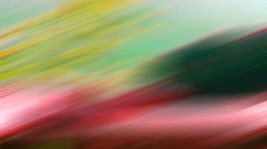 Kırmızı bir yüzeyde yeşil bir topun bulanık bir resmi