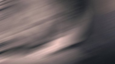 Kaykay tutan birinin bulanık bir fotoğrafı.