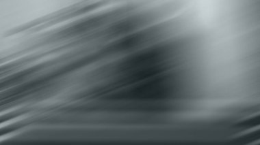 Bankta oturan birinin bulanık görüntüsü.